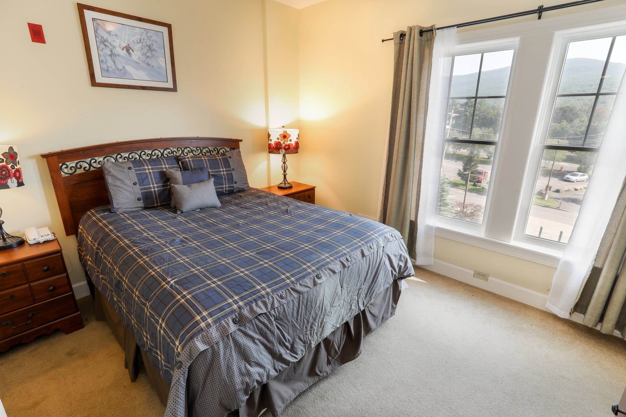 image A cozy bedroom with natural light and soft bedding for a peaceful night’s rest.