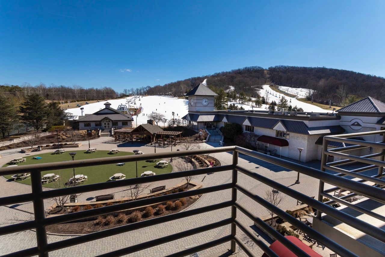 image Wake up to stunning mountain views and a front-row seat to the slopes from your private balcony.