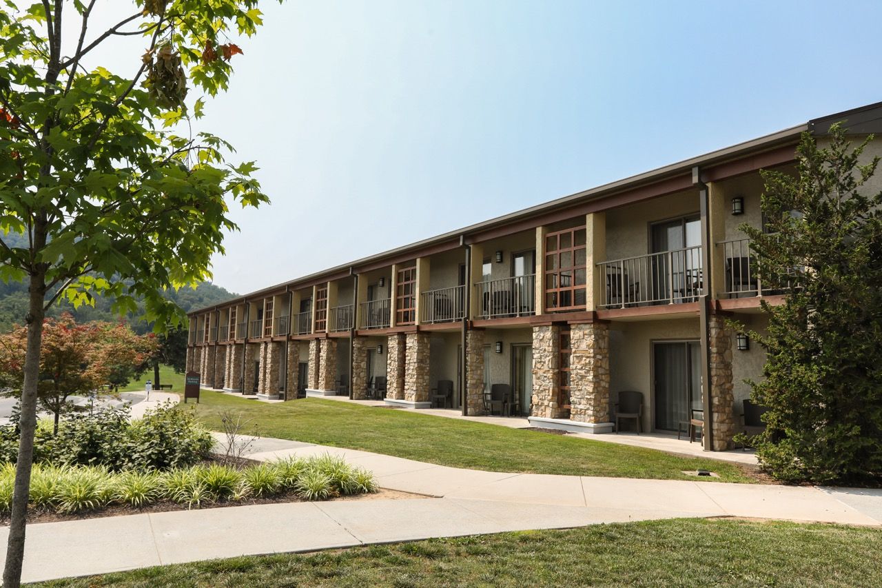 image A beautifully designed lodge-style retreat with rustic charm and peaceful walkways.