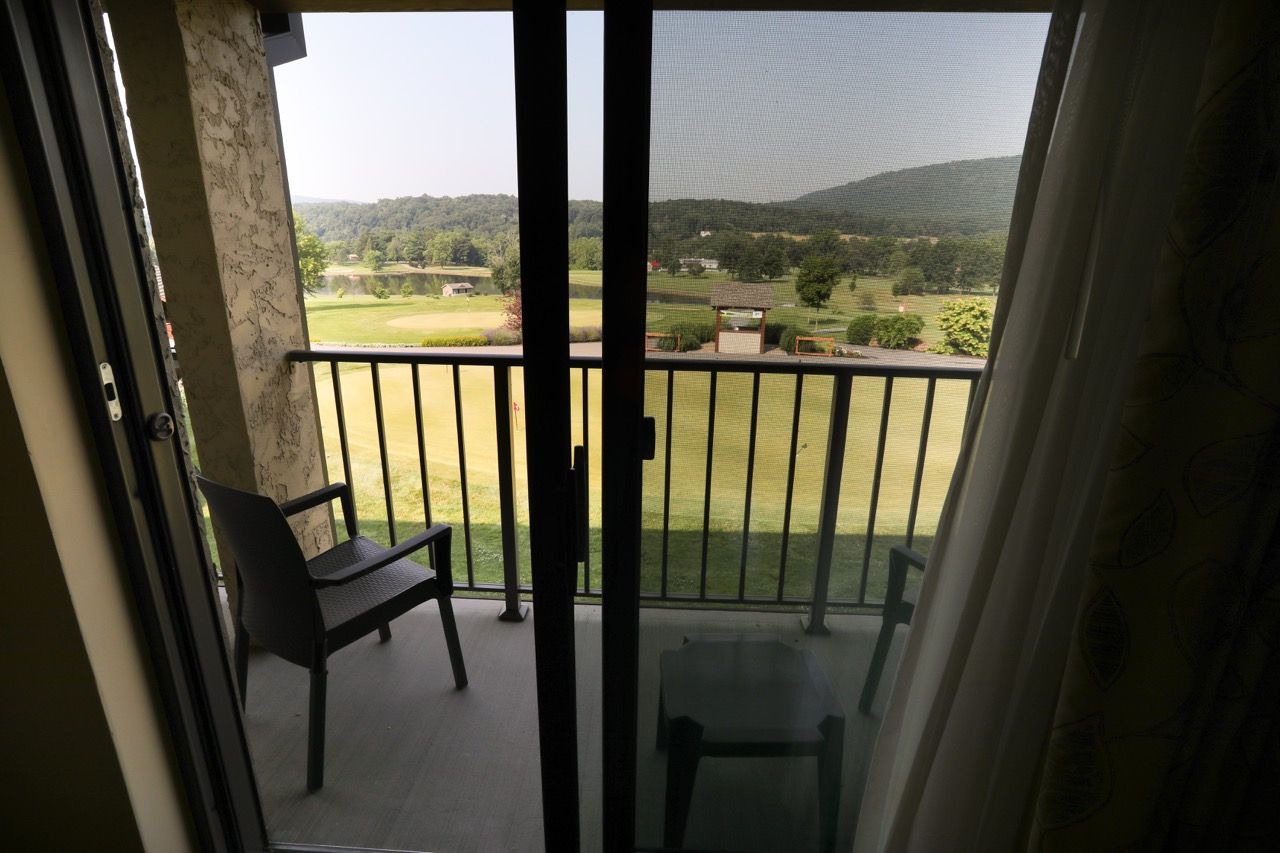 image Private balcony with stunning views of the surrounding landscape, ideal for enjoying the outdoors.