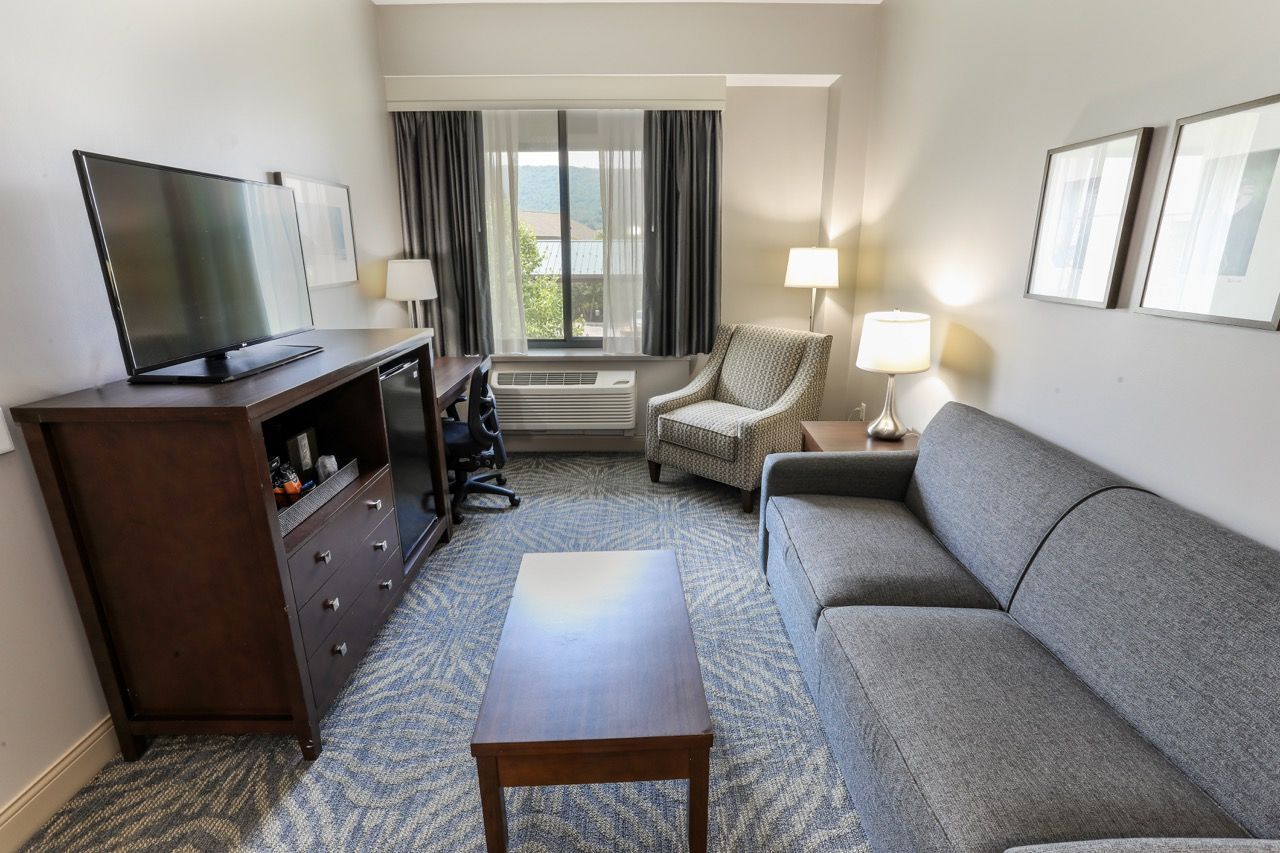 image Well-appointed suite with ample seating and a separate living area, perfect for unwinding.