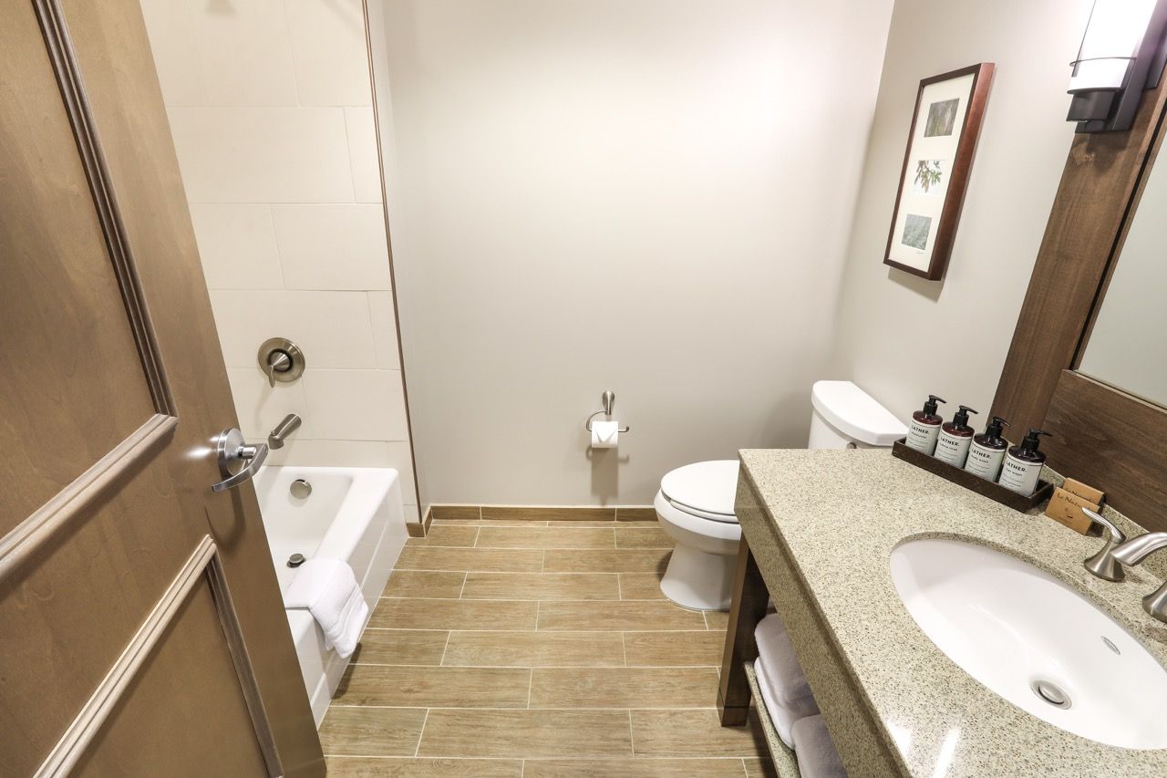 image A modern and well-appointed bathroom with elegant finishes.