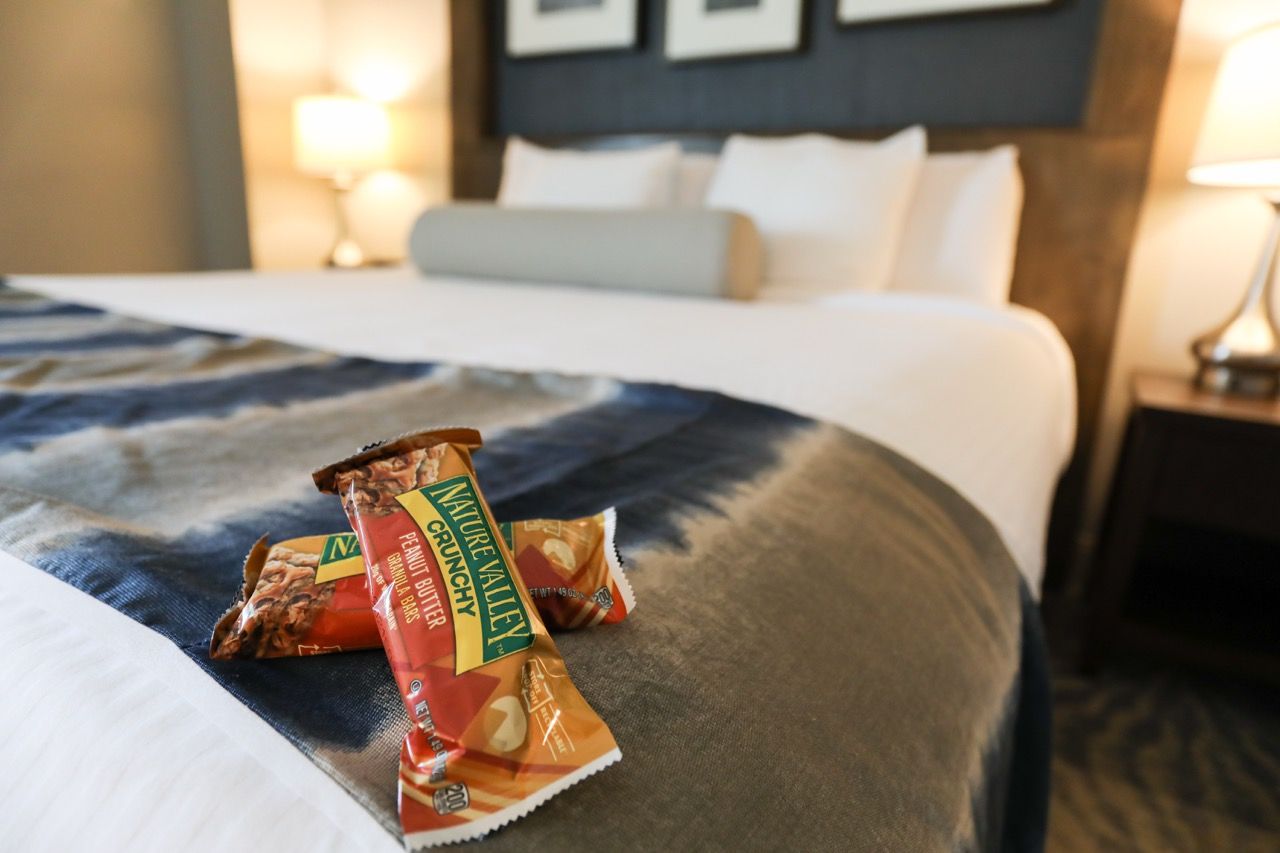 image A warm welcome awaits with thoughtful touches and a cozy, inviting bed.