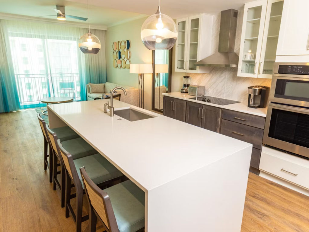 image Modern kitchen with a spacious island and high-end appliances, perfect for cooking and dining in.