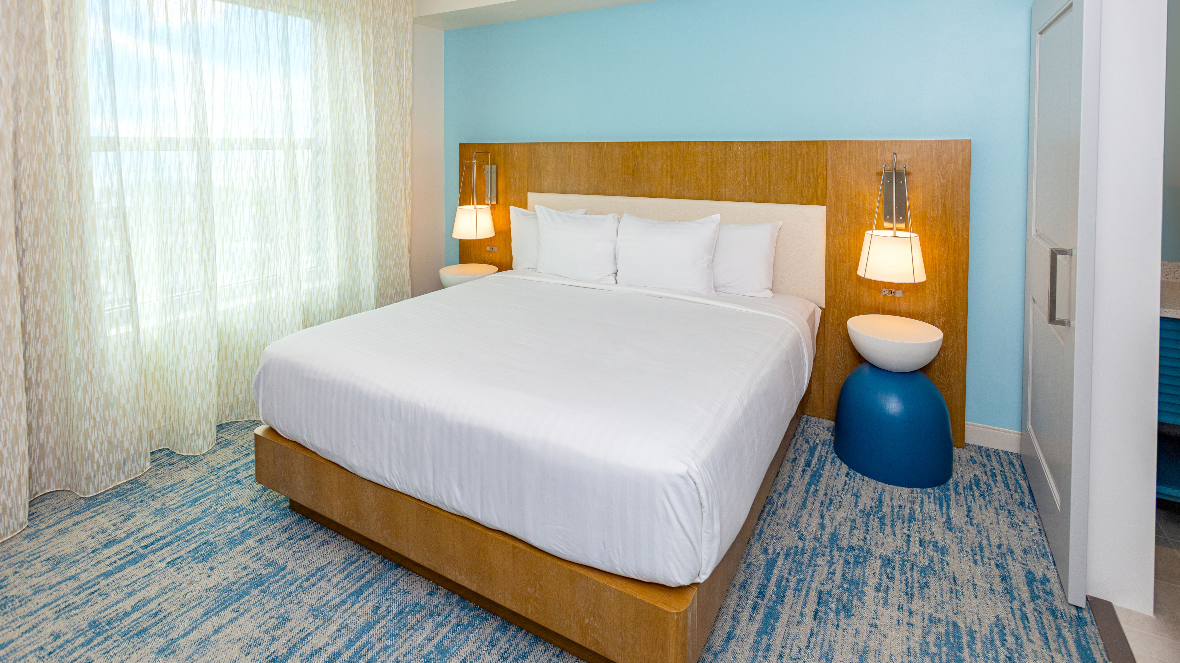 image Peaceful bedroom with soft tones and cozy bedding, creating a perfect escape for restful nights.