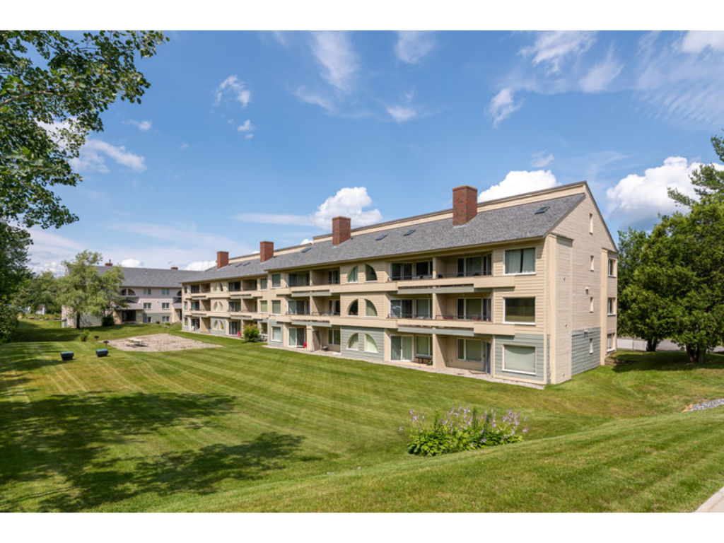 image Spacious and welcoming property with ample green space, perfect for enjoying the serene mountain surroundings.