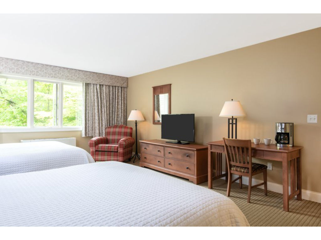 image Soft linens and a restful ambiance ensure a peaceful night’s sleep after an active day outdoors.