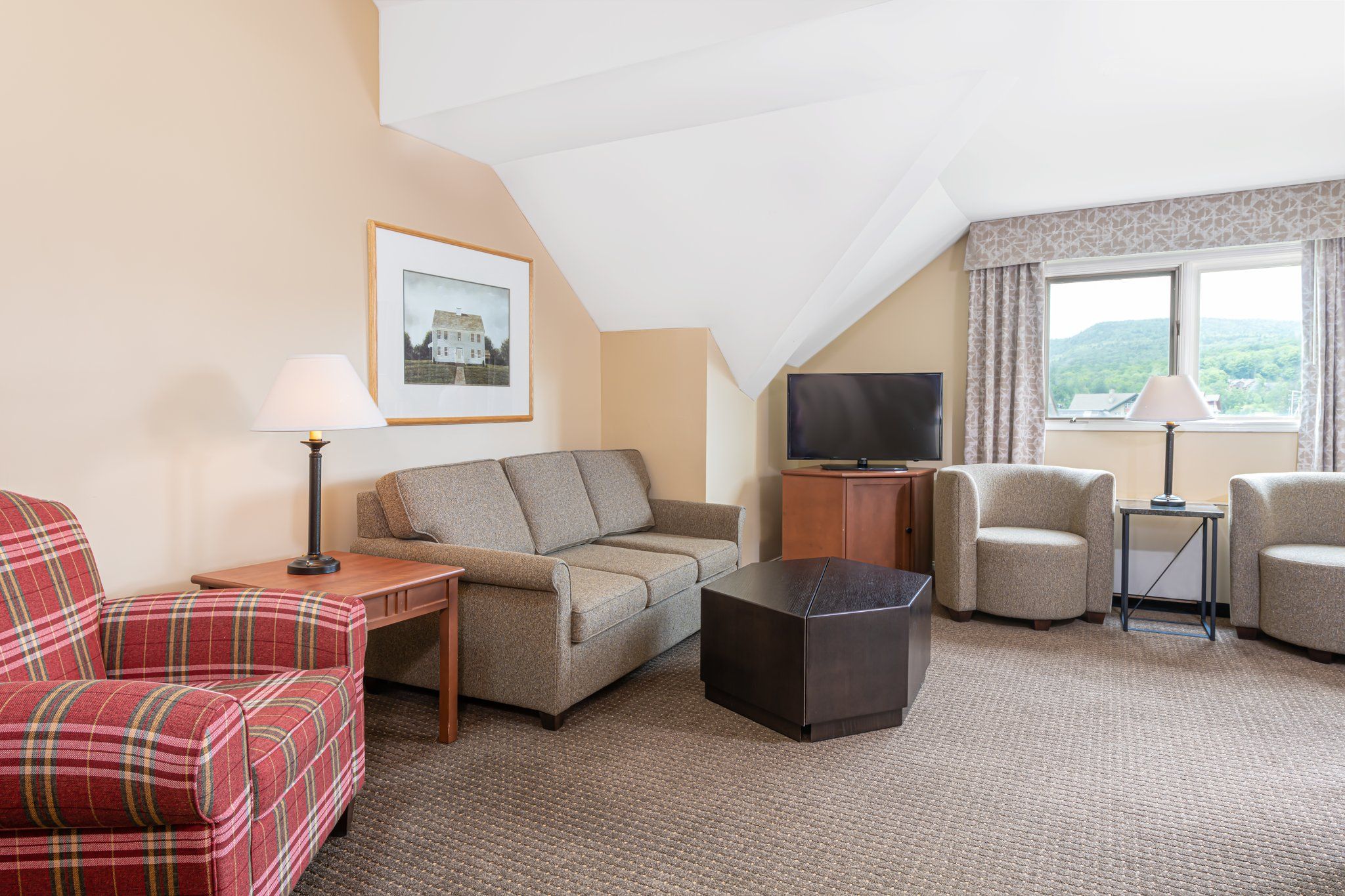 image A welcoming living room with plush seating, natural light, and calming views provides the ideal space for quiet moments or shared laughter.