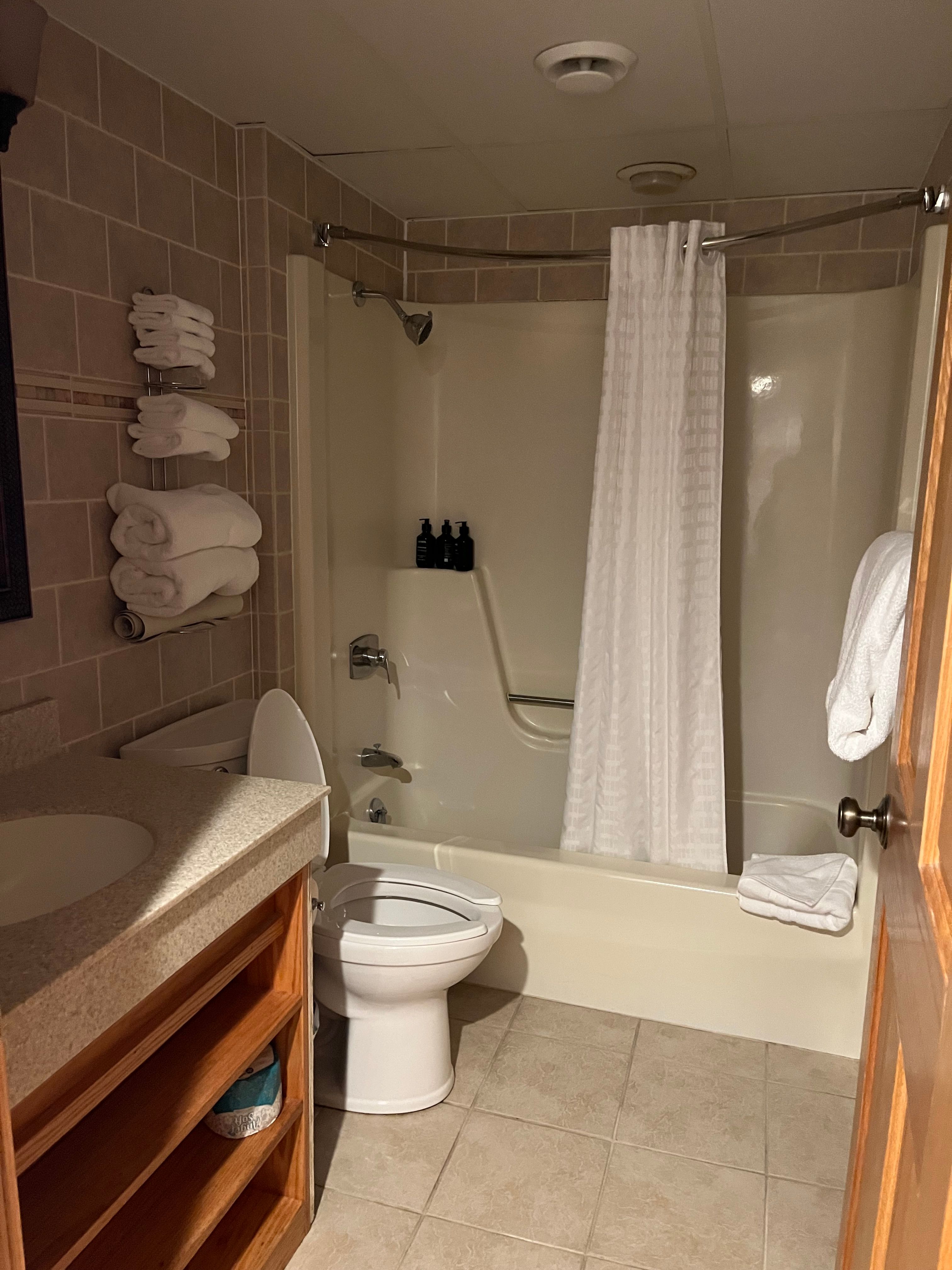 image Pristine bathroom with a clean and classic design, offering a refreshing space to unwind.