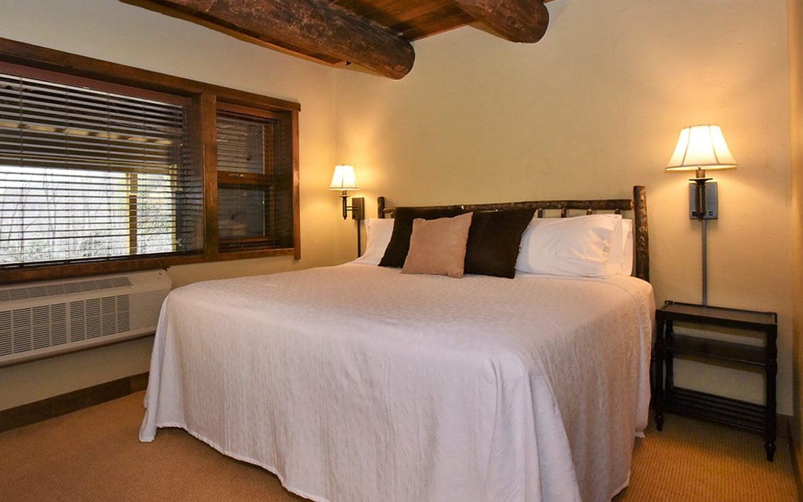 image Cozy bedroom with warm lighting and a welcoming ambiance, creating a perfect retreat for a restful night.