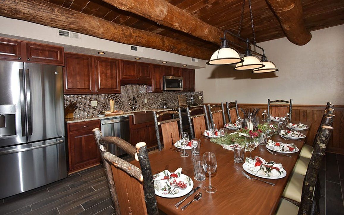 image Spacious dining area with a rustic touch, perfect for enjoying meals together in a cozy, inviting atmosphere.