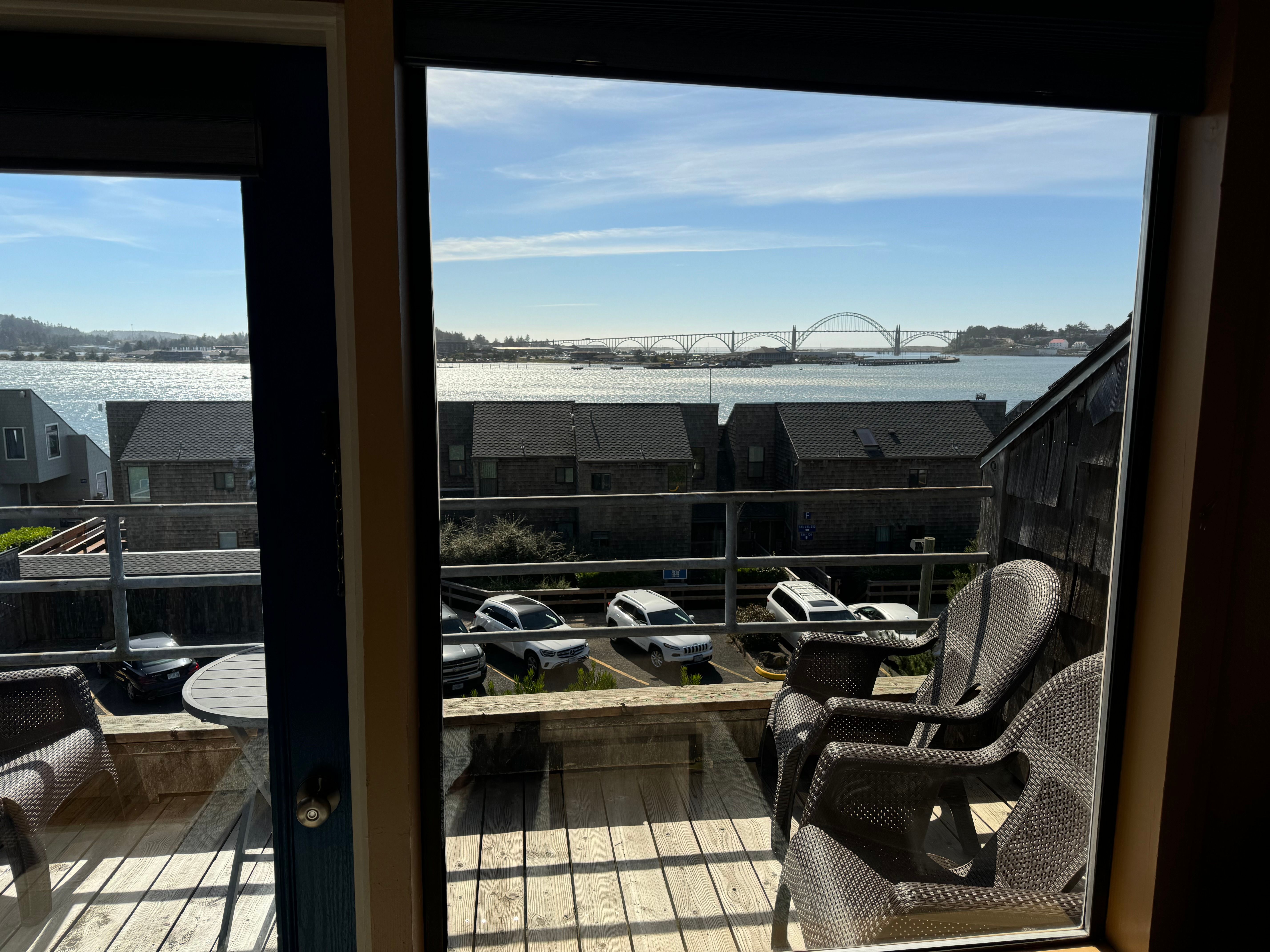 image Step out onto the private balcony and take in the fresh air and picturesque views of the marina.