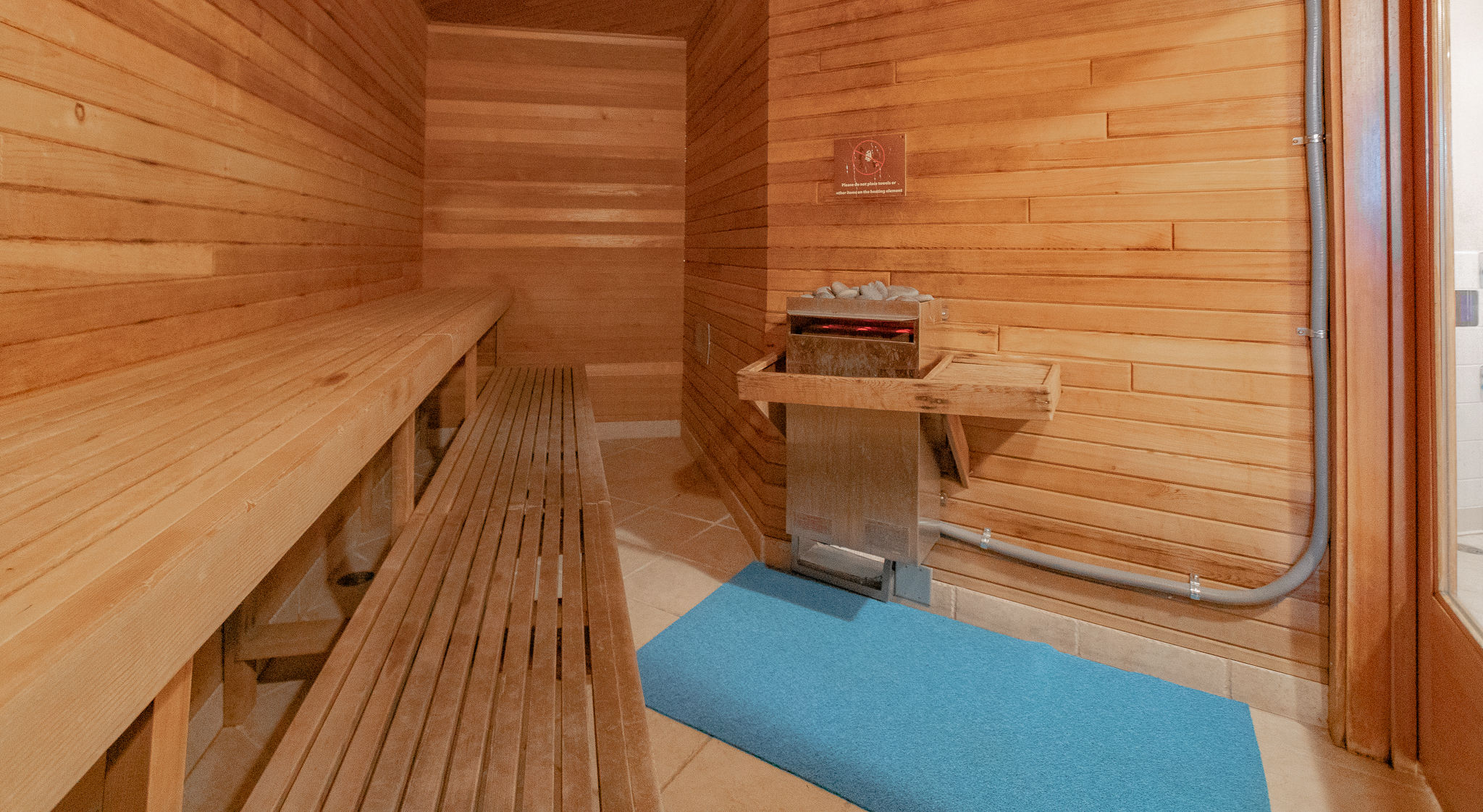 image Step into this serene sauna and experience pure relaxation, surrounded by warm wood tones and a calming ambiance.