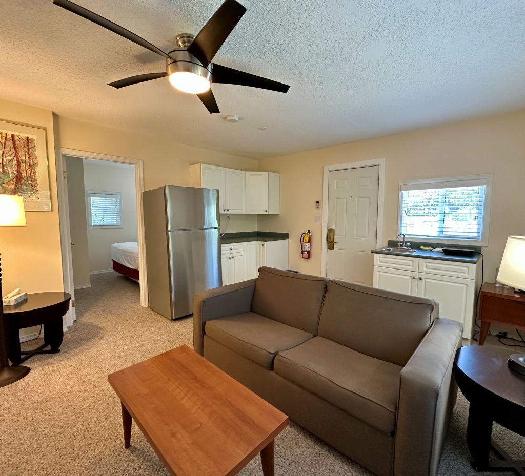 image Spacious living area with plenty of room to gather, relax, and feel at home.