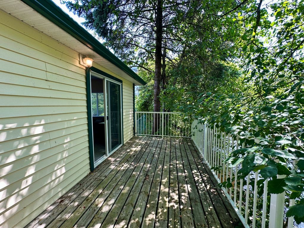 image Peaceful patio surrounded by greenery, the perfect spot for morning coffee or evening relaxation.