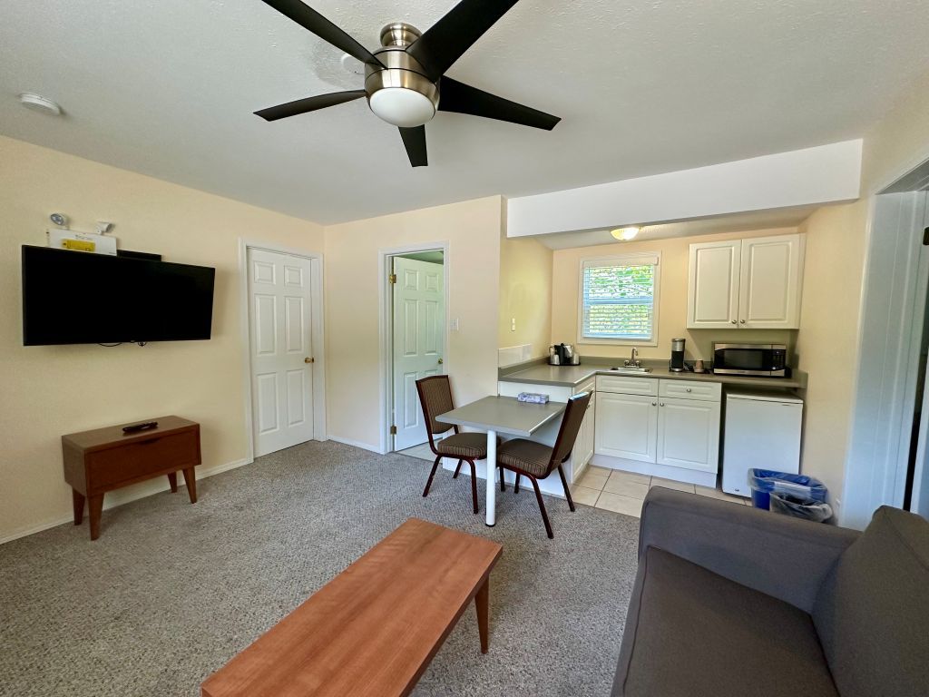 image Open living space designed for gathering, with plenty of room to relax together.