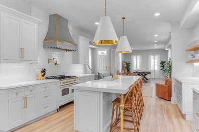 Another angle of the spacious kitchen, emphasizing its clean design and modern elegance.