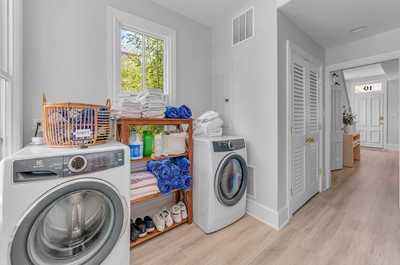 Convenient laundry area equipped with a washer and dryer for added comfort during your stay.