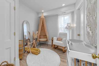 Cozy nursery area with charming decor, perfect for families traveling with little ones.