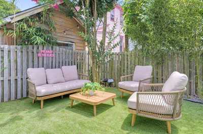 Relaxing outdoor lounge area with comfortable seating, perfect for unwinding in the fresh air.