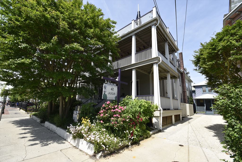 image The Seashell’s historic charm shines with its welcoming front porch – the perfect spot to sip coffee and watch Jackson Street come alive.