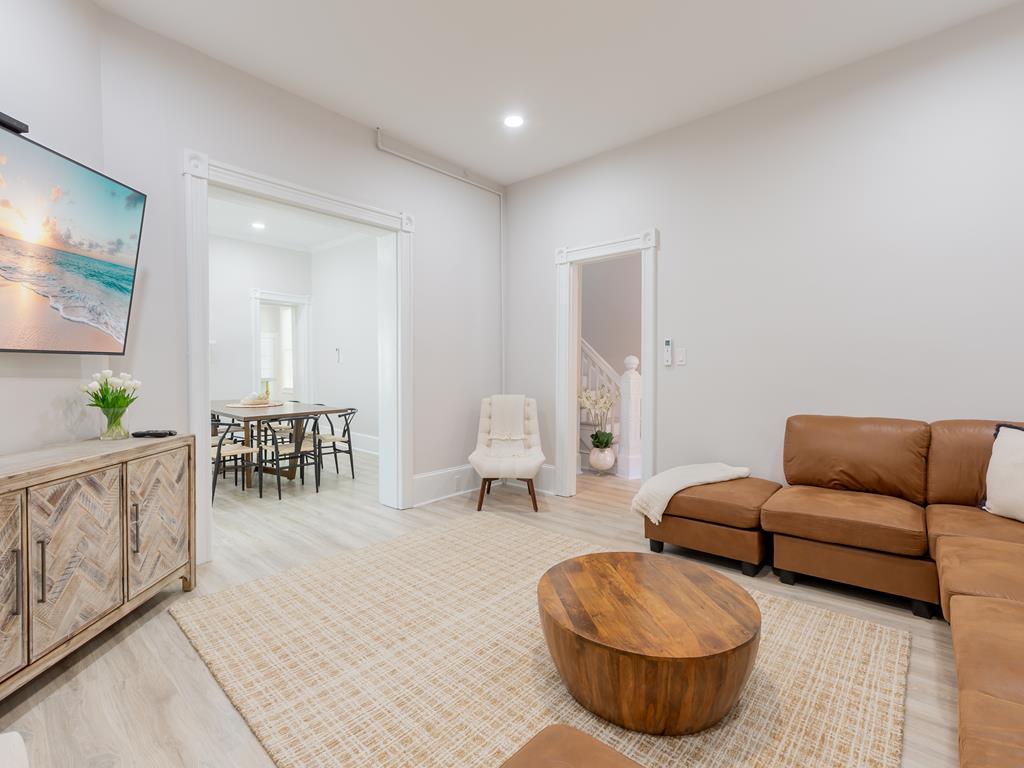 image Cozy and modern lounge space with bright décor, offering a perfect spot to unwind after a day at the beach.