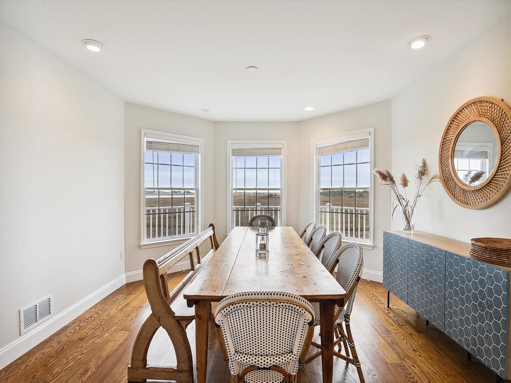 image Dine in style with breathtaking scenic views from this luxurious waterfront dining area, perfect for entertaining family and friends.