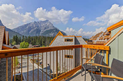 A private balcony with stunning mountain views, offering the perfect setting to relax and soak in the beauty of nature.