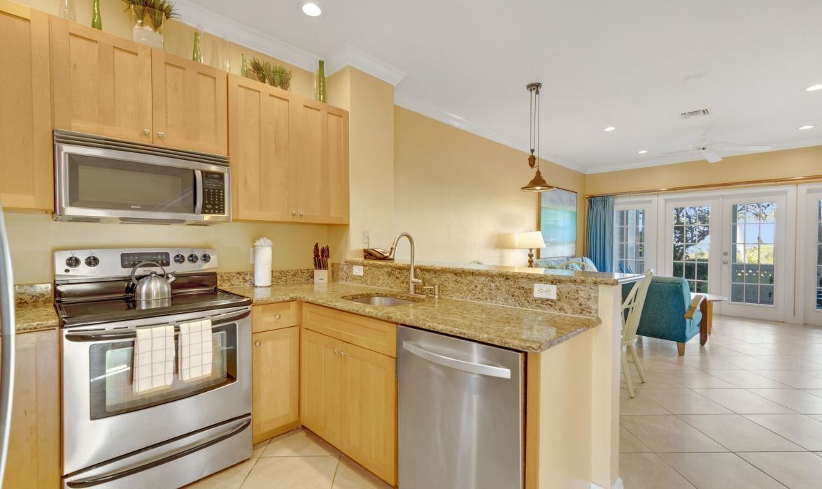 image Kitchen with wood cabinetry and stainless appliances