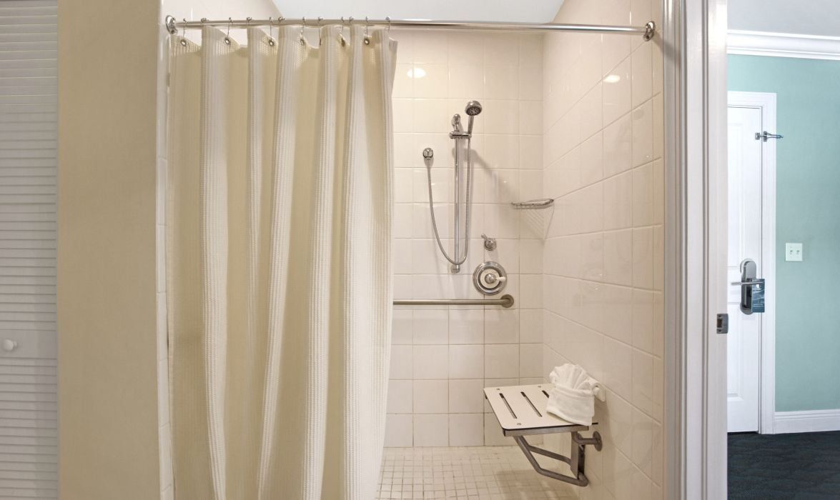 image Roll-in accessible shower with support bars