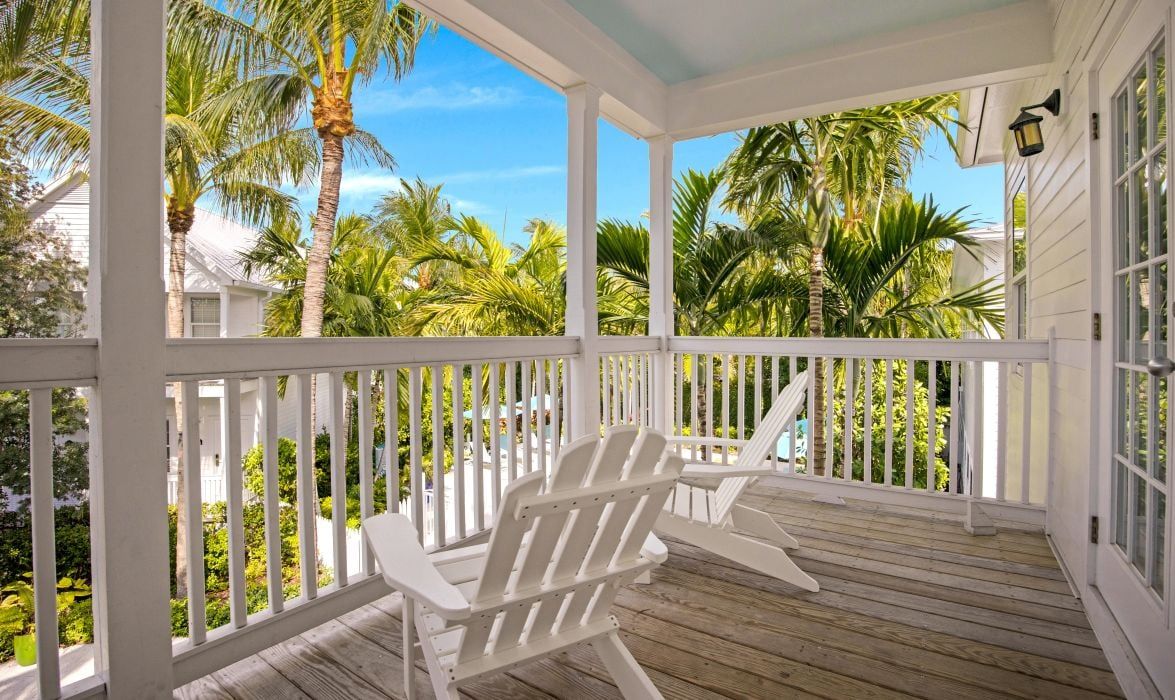 image Private balcony with chairs and garden views