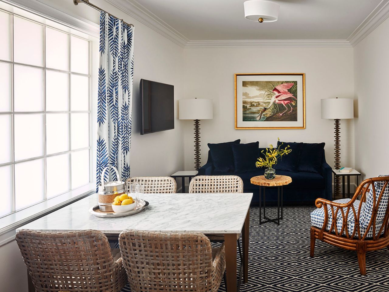 image Chic dining nook with natural textures and vibrant accents offers a cozy space for meals or conversation.