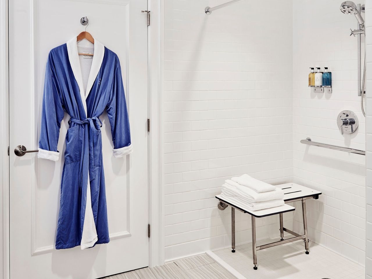 image Accessible bathroom designed for comfort, featuring a spacious shower and thoughtful details.