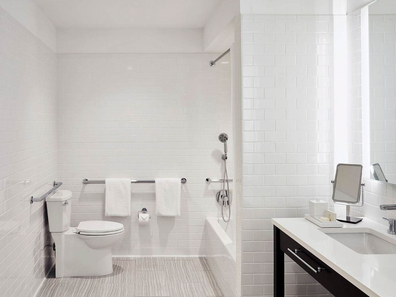 image Modern bathroom with a clean, functional layout, offering a relaxing and accommodating space.