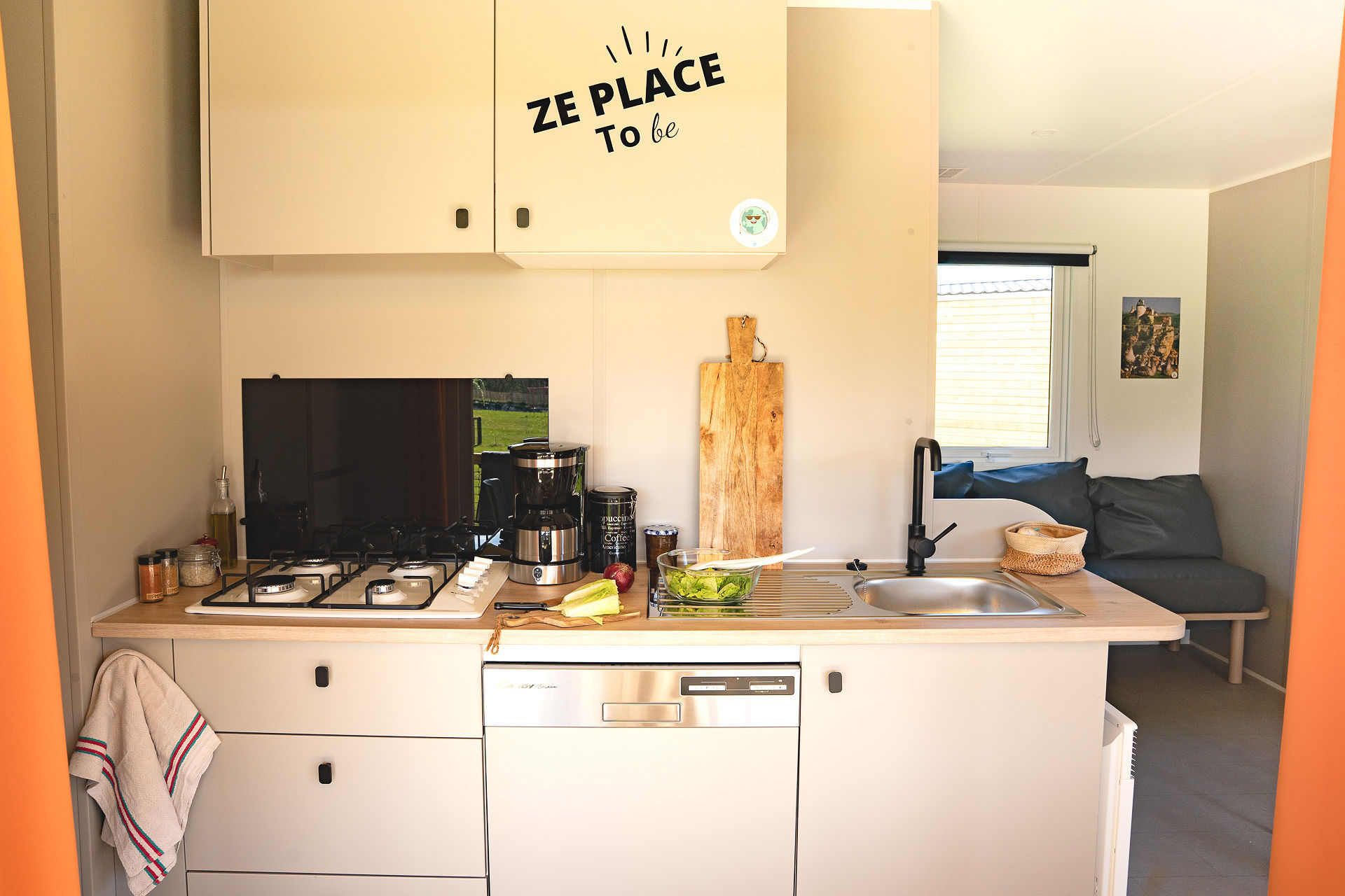 image The contemporary kitchen blends functionality with charm, making meal preparation a joyful experience for the entire family.