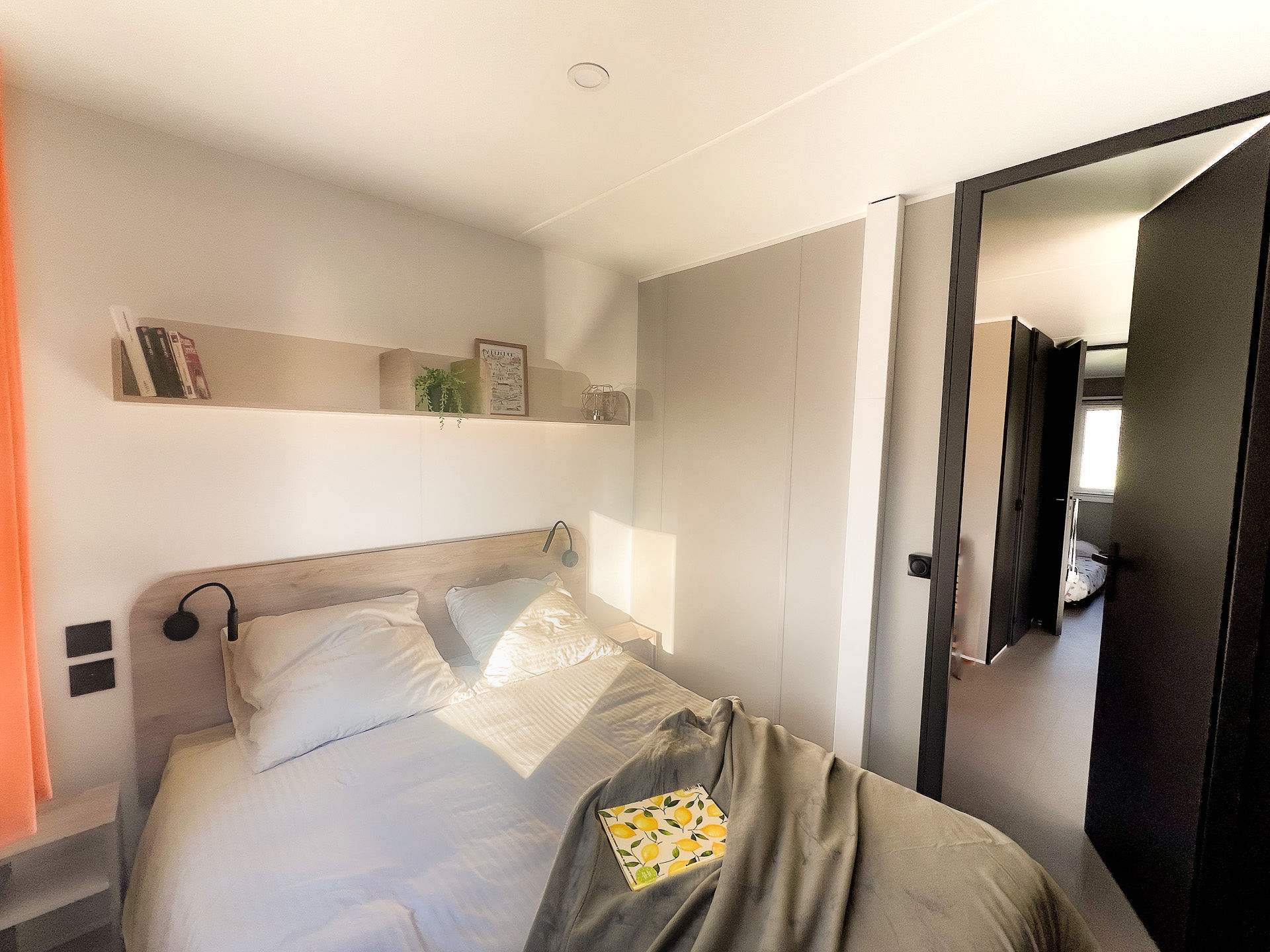 image The master bedroom features a serene atmosphere and ample light, creating a tranquil sanctuary for parents to unwind after a day of family adventures.
