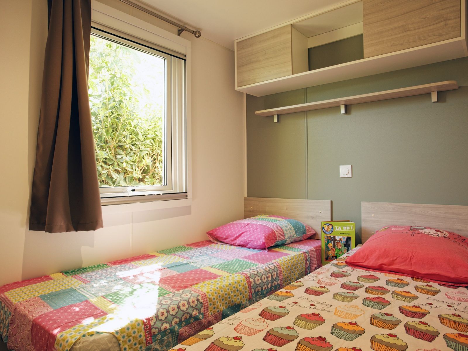 image Cosy bedroom with twin beds, ideal for families or friends.