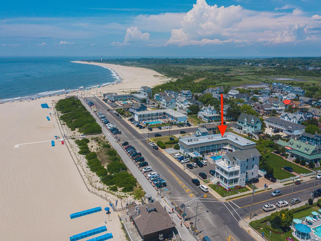 image Aerial view of the condo’s prime location in Cape May’s sought-after Cove Beach area, just steps from the sand.