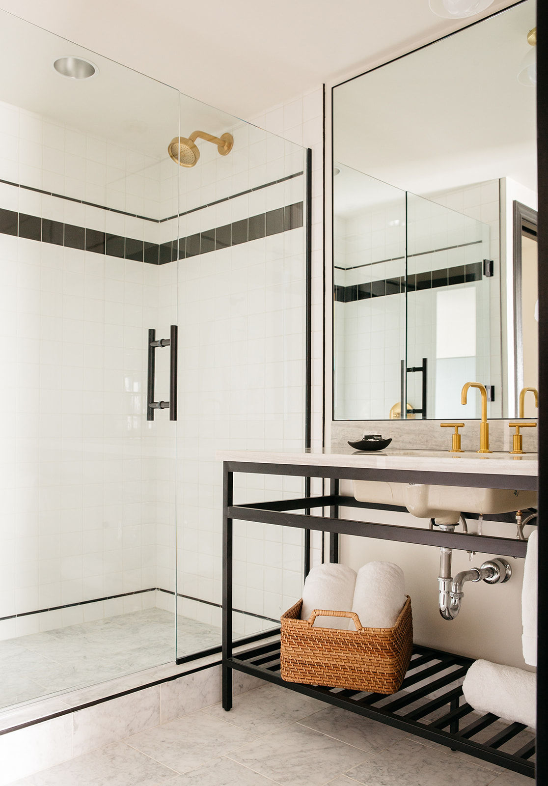 image Sleek and modern bathroom, where elegant finishes and thoughtful details create a spa-like retreat.