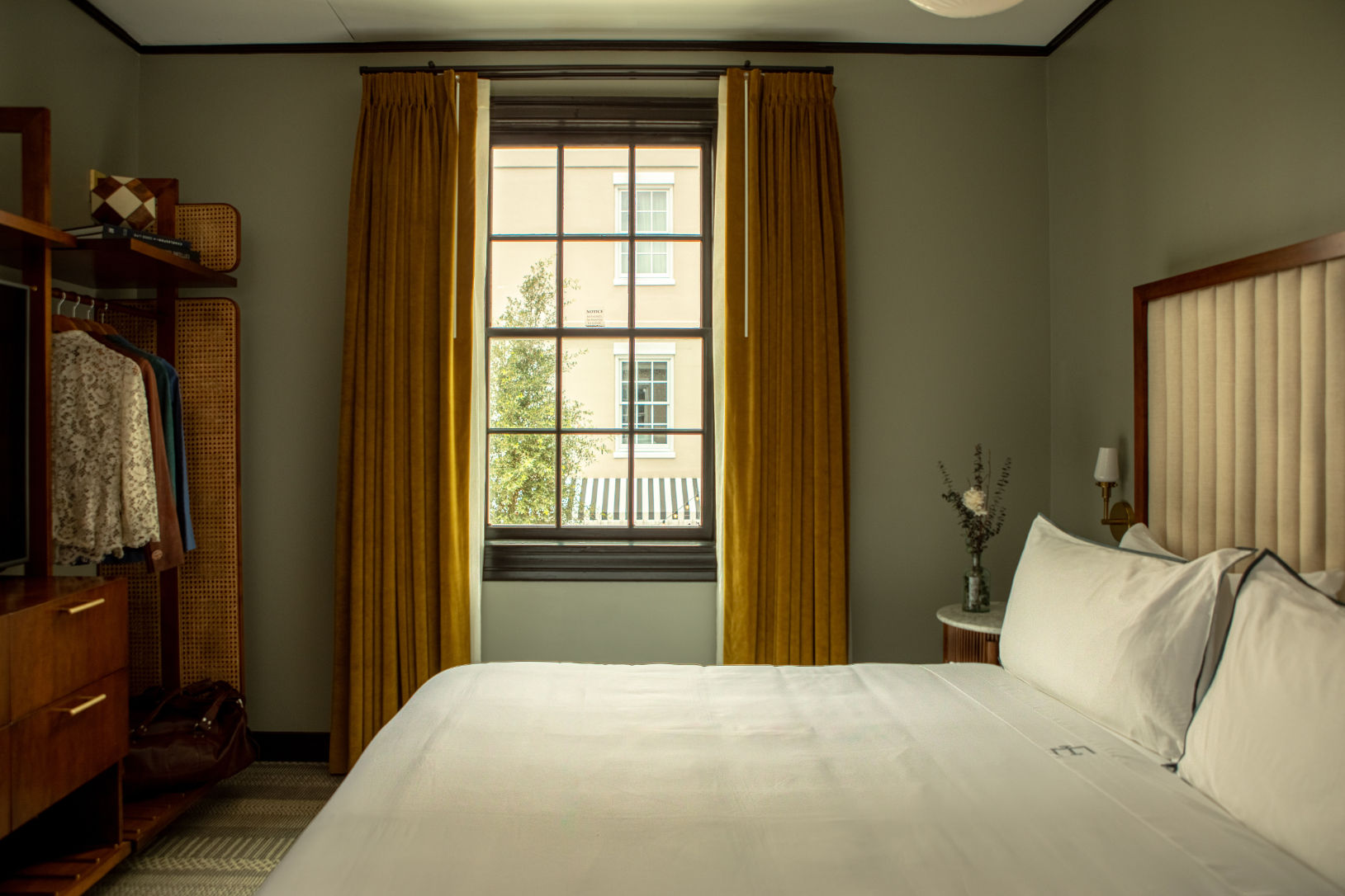 image Tranquil bedroom with a timeless touch, featuring soft lighting, rich textures, and a serene ambiance.