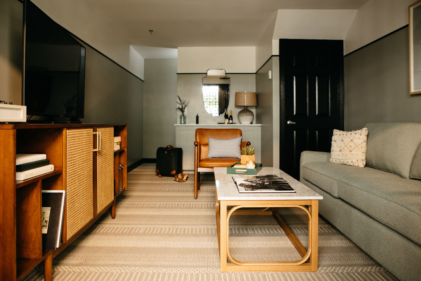image Spacious and stylish suite, where warm tones and modern furnishings create a cozy yet refined retreat.
