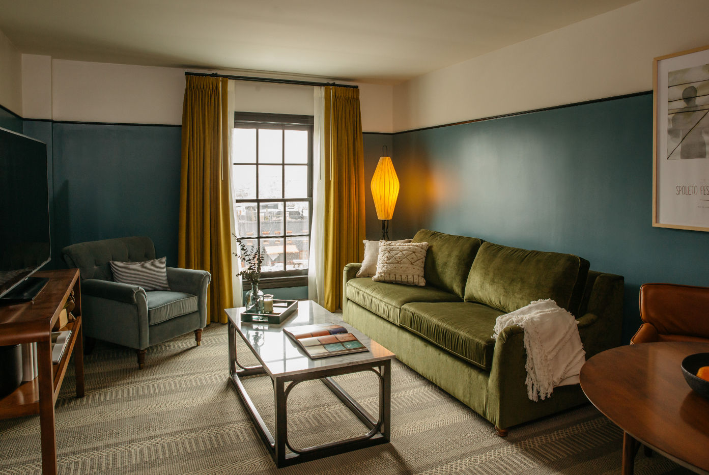 image Inviting living space, where plush seating, warm lighting, and rich hues create a cozy yet sophisticated retreat.
