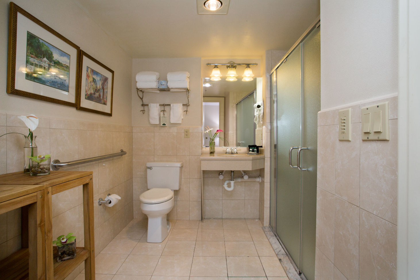 image A spacious and well-appointed bathroom with elegant finishes for a refreshing experience.