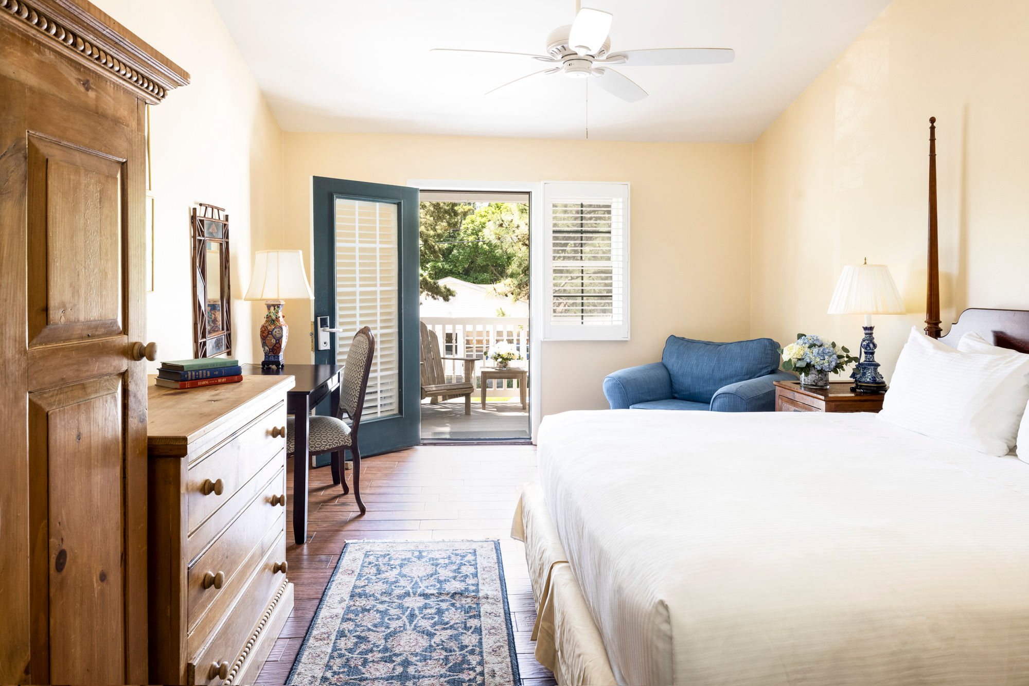 image A charming suite with rustic furnishings and a private patio for a peaceful escape.