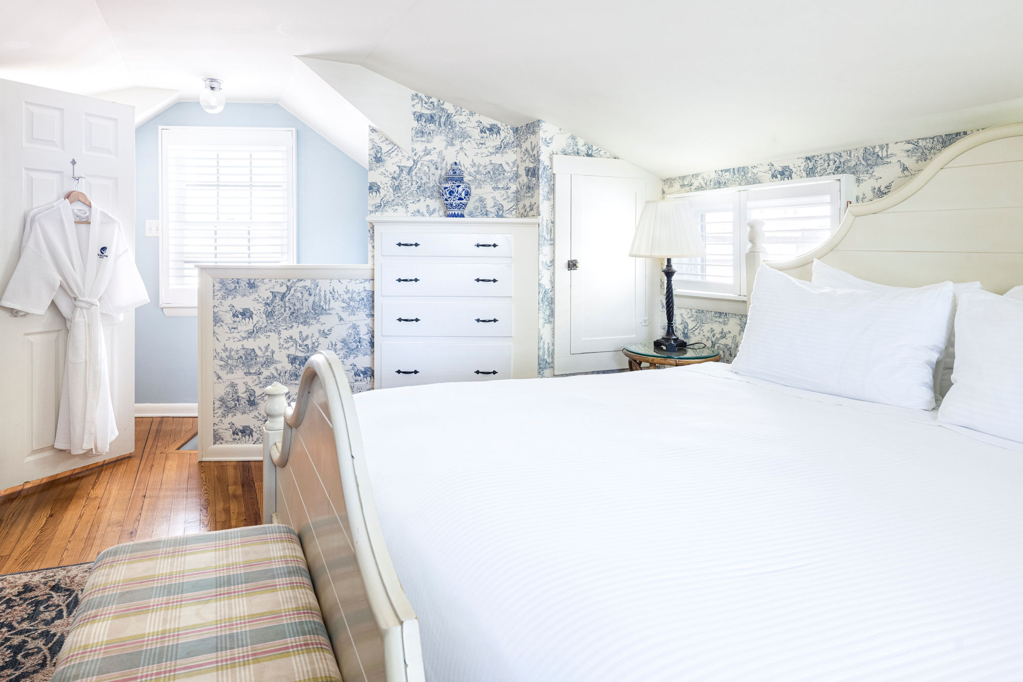 image Soft tones and elegant touches create a cozy bedroom designed for ultimate comfort.