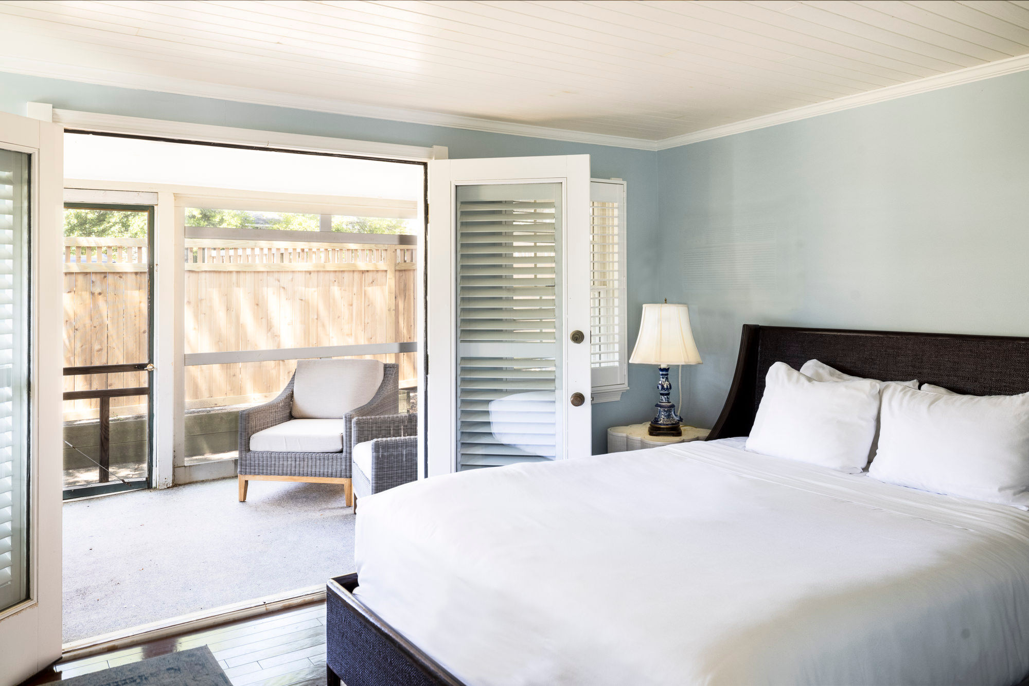 image A serene bedroom with seamless indoor-outdoor flow, perfect for enjoying fresh air and natural light.