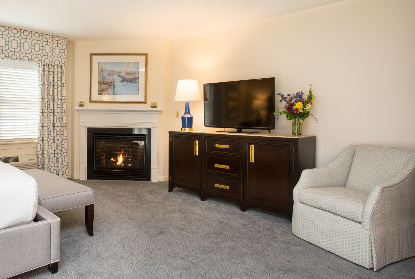 image Cozy sitting area with a warm fireplace, stylish furnishings, and a serene ambiance for ultimate relaxation.