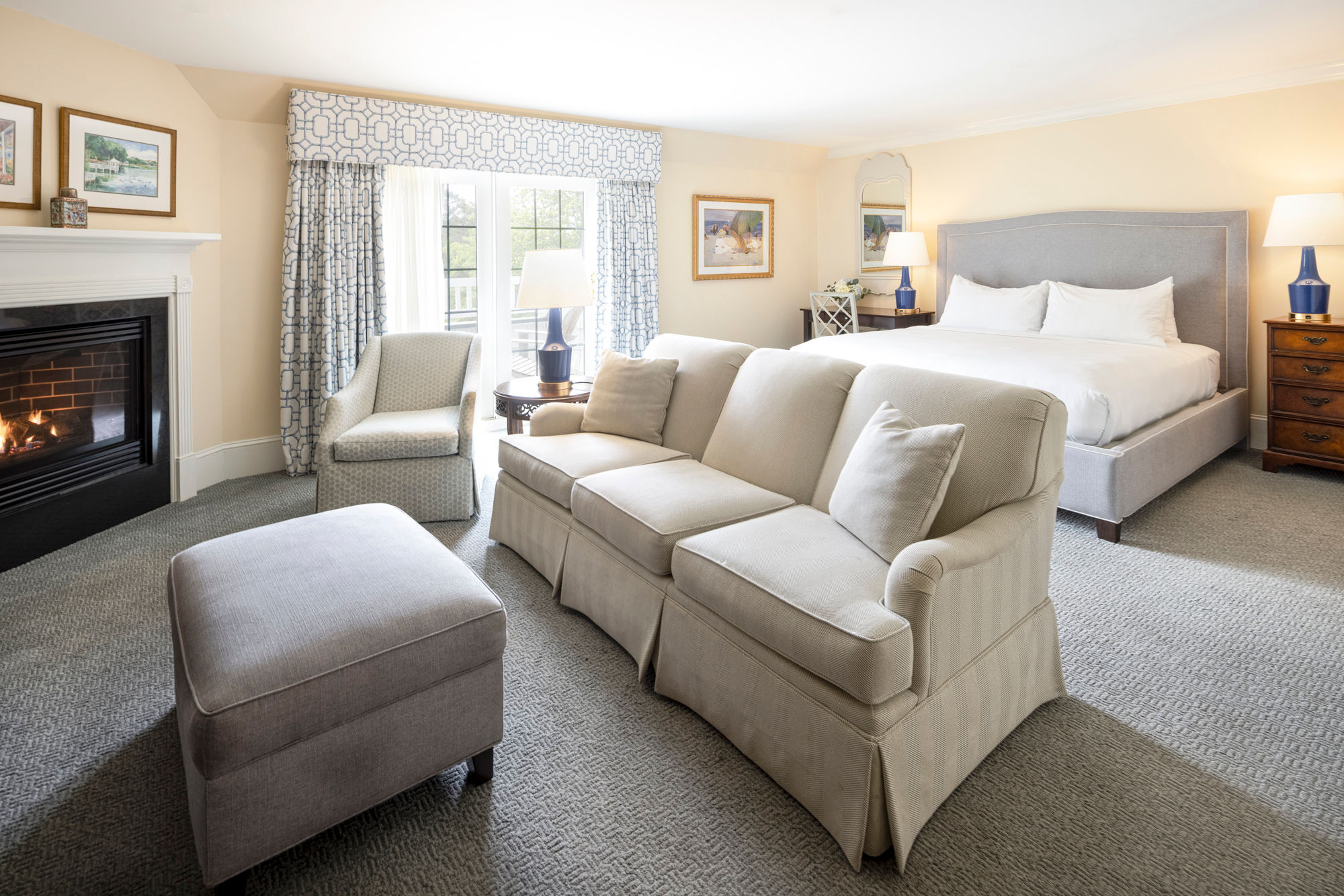 image A cozy fireplace and elegant furnishings make this suite the perfect blend of warmth and relaxation.