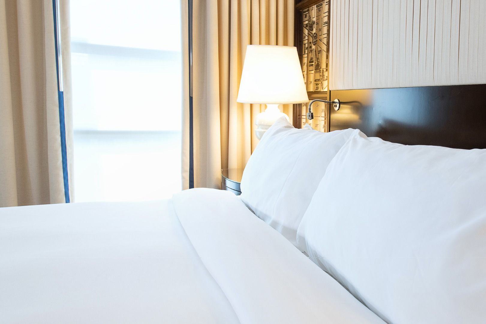 image Cozy and inviting, with crisp linens and warm accents designed for ultimate relaxation.