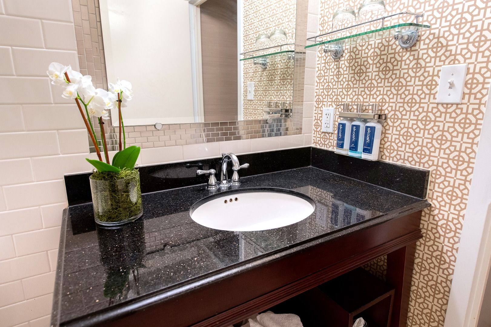 image Sophisticated bathroom design, featuring sleek finishes and thoughtful amenities.